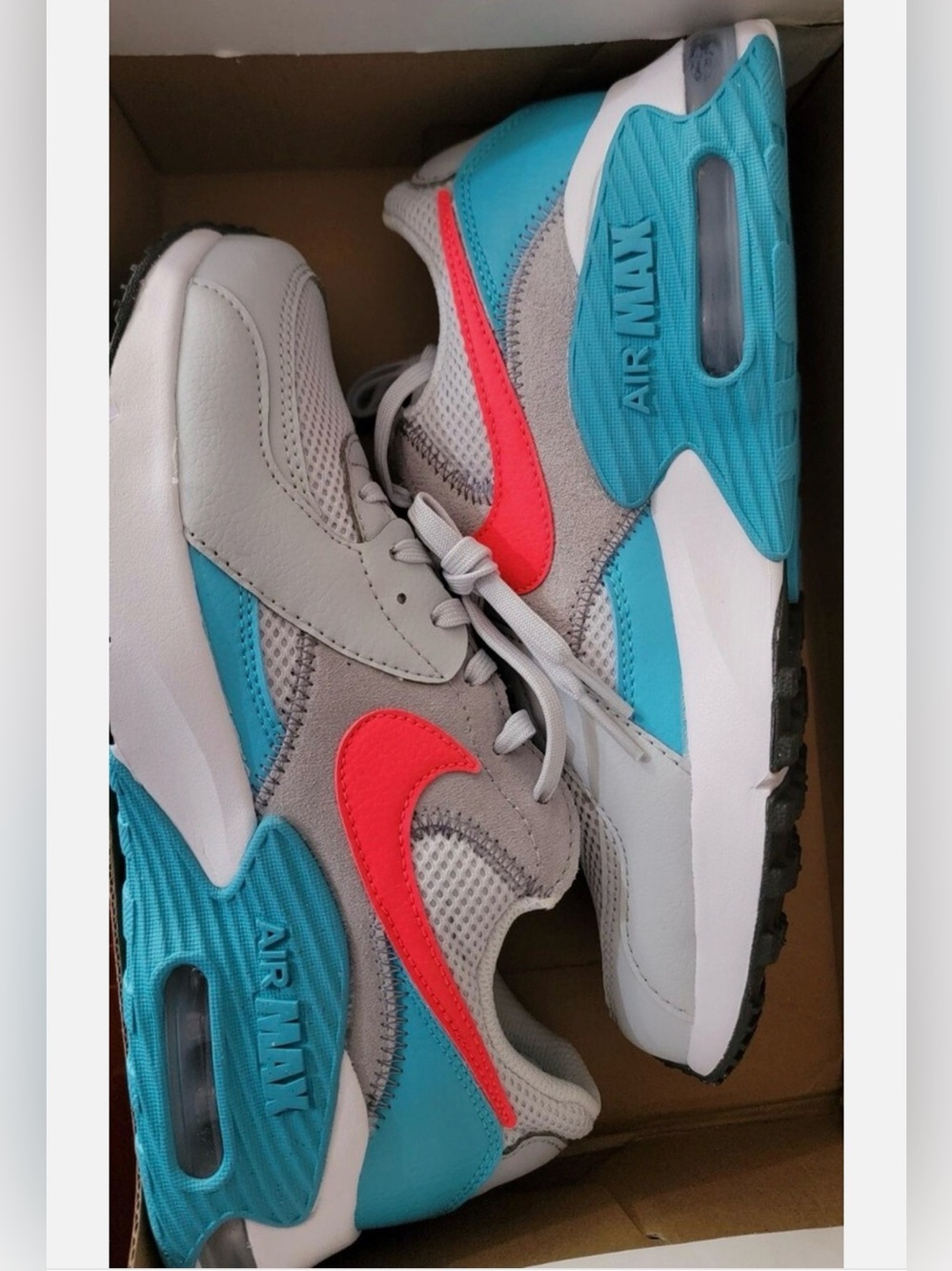 Nike Air Max Light Gray Sneakers with Red and Teal Accents